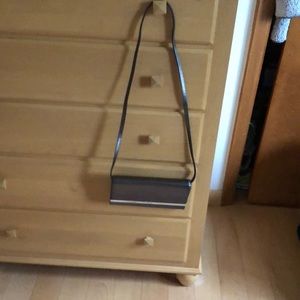 Black with silver Michael kors across purse